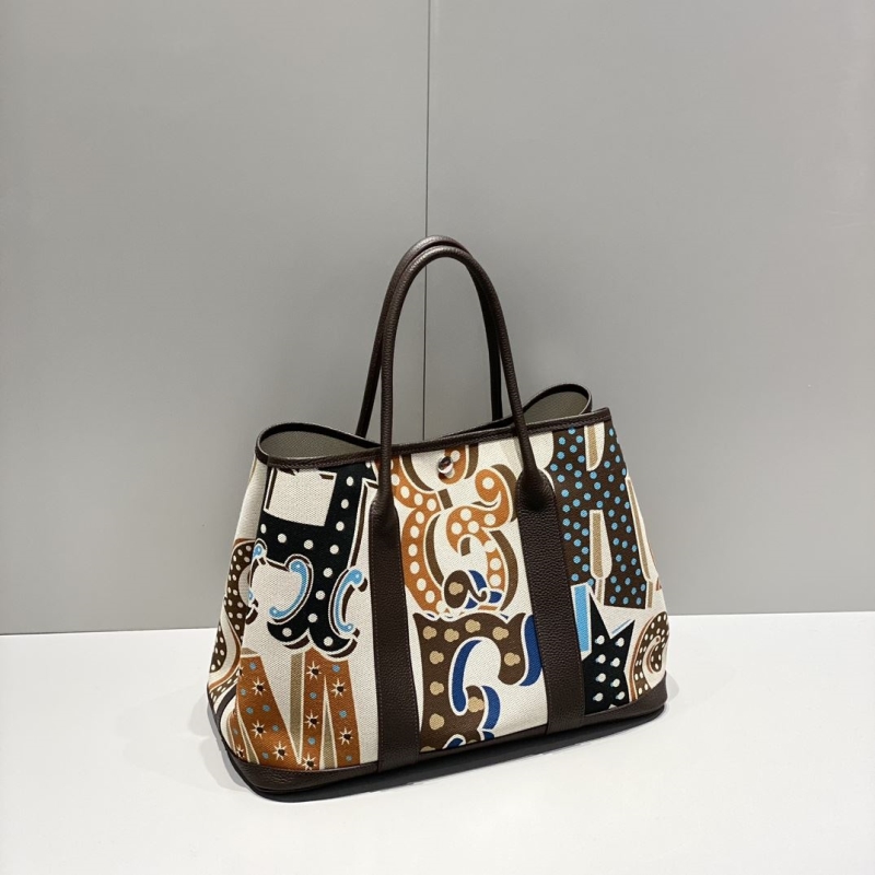 H**mes shopping bags